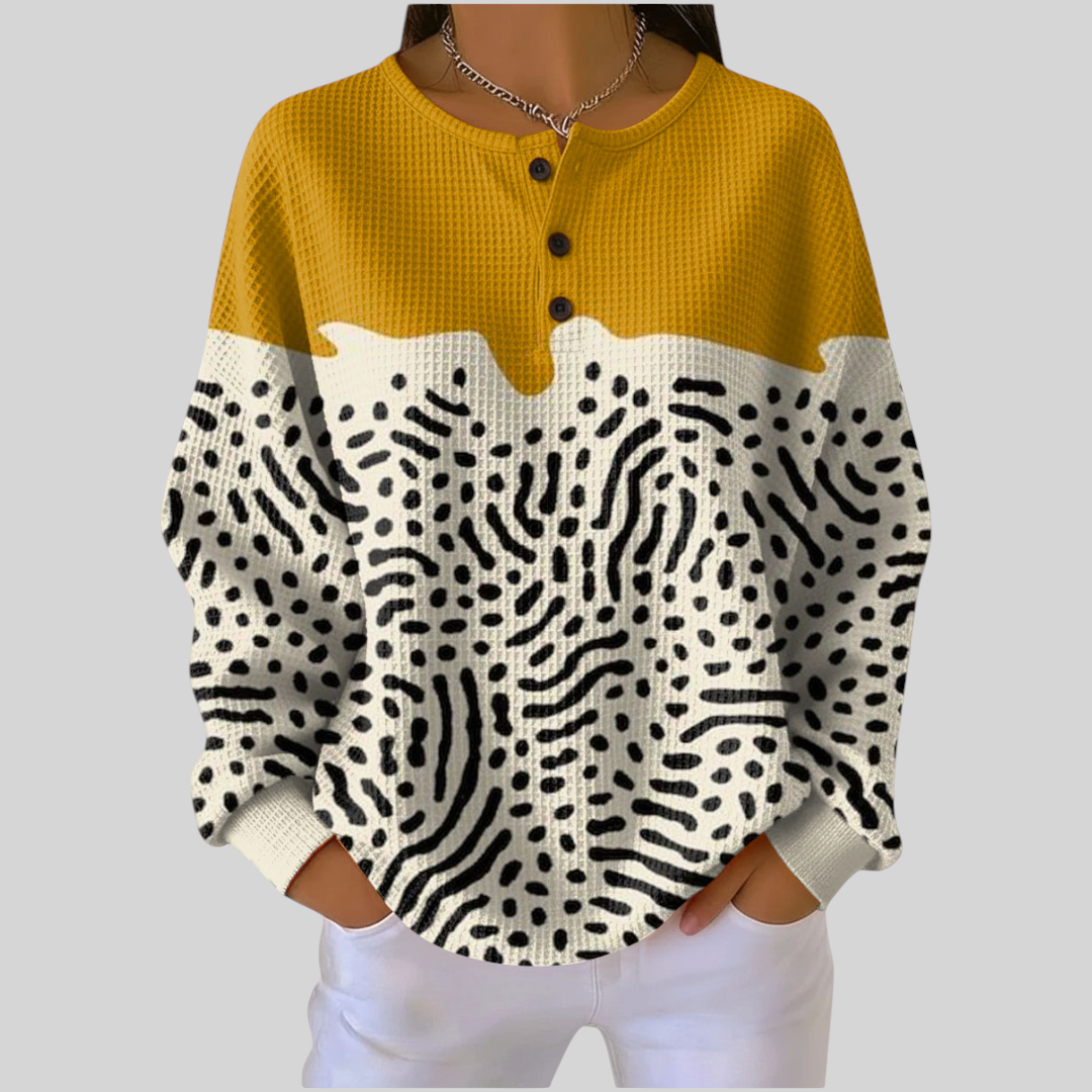 Moletom feminino A minha loja 2 com estampa abstrata em preto e branco e parte superior amarela com botões